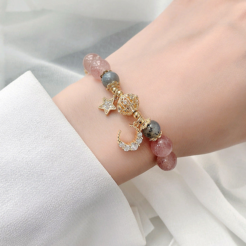 Bracelet en pierre naturelle avec pendentifs.