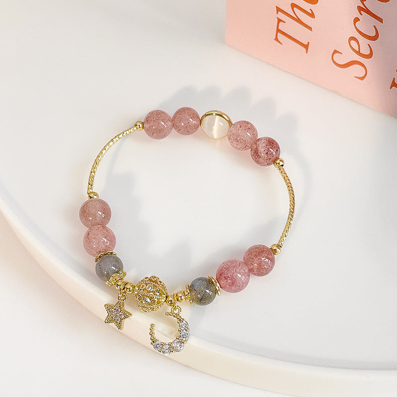 Bracelet en pierre naturelle avec pendentifs.