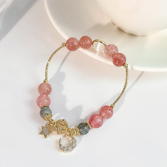 Bracelet en pierre naturelle avec pendentifs.