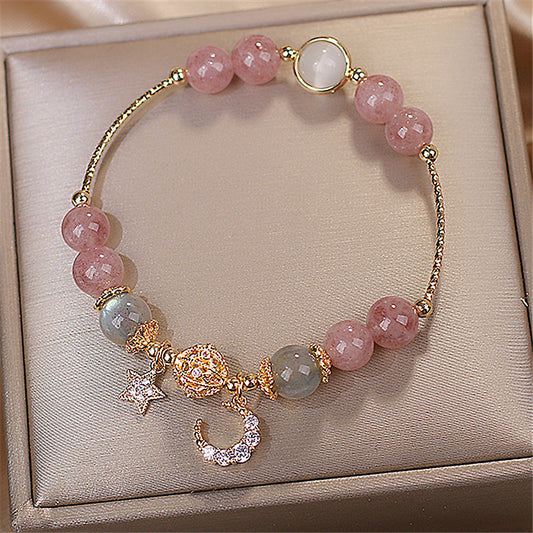 Bracelet en pierre naturelle avec pendentifs.